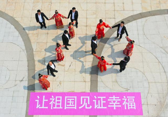 “家国同庆,爱满剡城”嵊州集体婚礼倡导新风尚