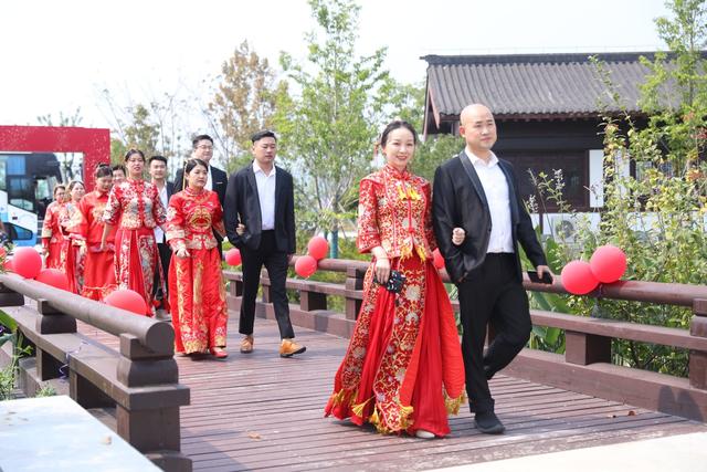 “家国同庆,爱满剡城”嵊州集体婚礼倡导新风尚
