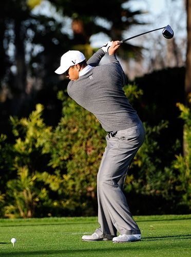 组图伍兹宣布无限期休战后首次恢复训练