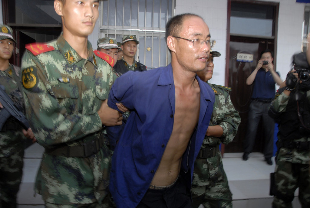 河南连杀5人嫌犯落网 认罪现场谈笑风生