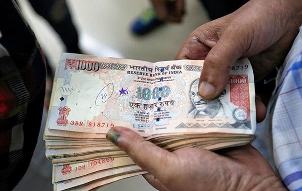 双语阅读:印度废除500和1000元卢比纸币