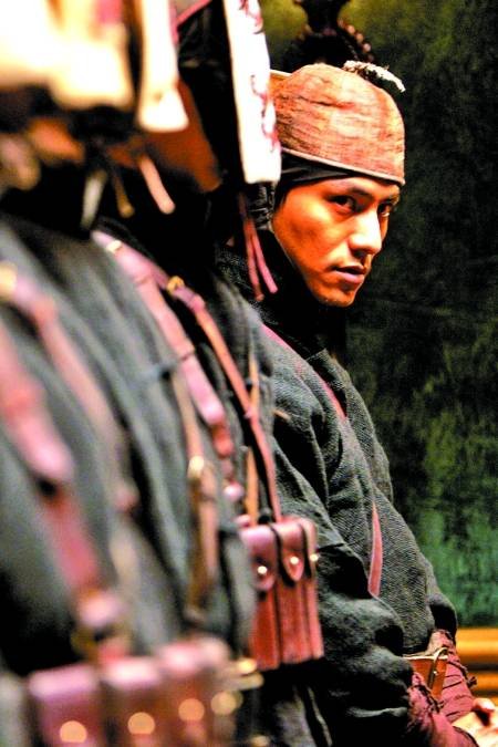 《让子弹飞》中陈坤扮演的胡万