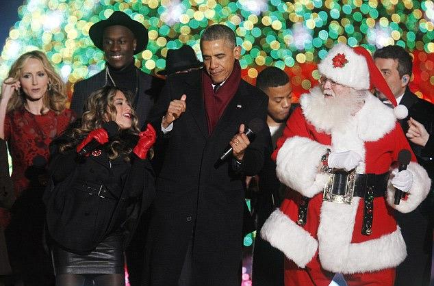 奥巴马在去年圣诞节上跳舞的场景(网页截图)