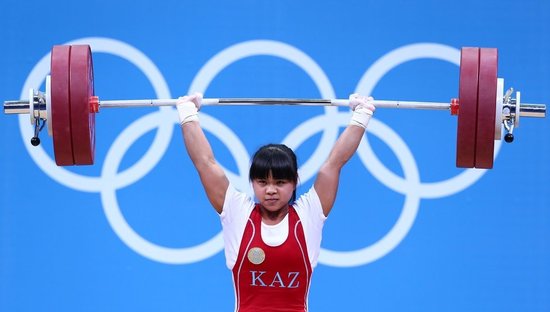 中国举重队为中国体育代表团夺得8枚金牌,分别是男子56公斤级龙清泉
