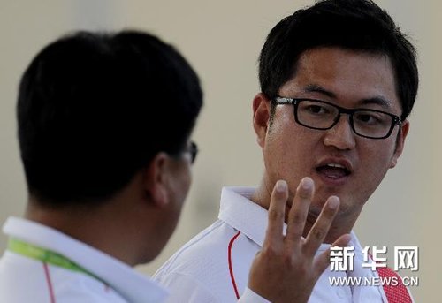 射箭项目开赛 韩国队箭指四金(组图)