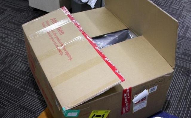 快递企业收开箱费被指霸王条款 争议源于政策缺失